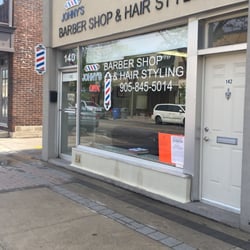 Johny's Barber Shop - Time for a cut!