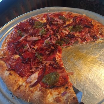 BZ's Bistro - The hammer, minus a couple slices. - Pizza Near Me - Tucson, Arizona