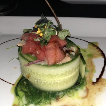 Selva Grill - Ceviche with watermelon on a bed of seaweed wrapped in thinly sliced cucumber. - Spanish Near Me - Sarasota, Florida Selva Grill - Ceviche with watermelon on a bed of seaweed wrapped in thinly sliced cucumber. - Spanish Near Me - Sarasota, Florida