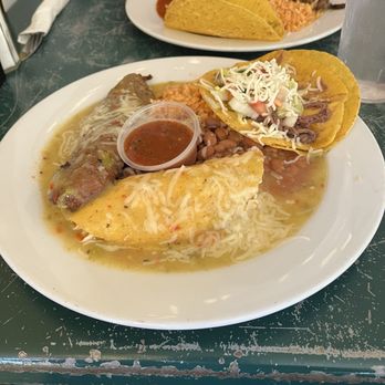 La Cueva Cafe - Plato Combinado- chile relleno, beef taco, chicken enchilada. - Mexican Near Me - Taos, New Mexico La Cueva Cafe - Plato Combinado- chile relleno, beef taco, chicken enchilada. - Mexican Near Me - Taos, New Mexico