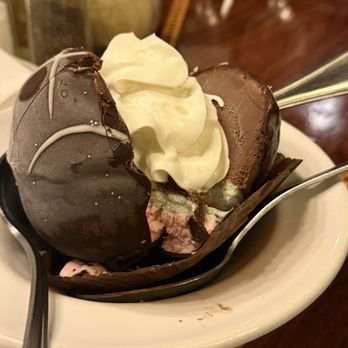 Lucia Ristorante - Spumoni ice cream dessert (strawberry- pistachio- vanilla) covered in a chocolate shell with cherry syrup and whip cream. - Italian Near Me - Boston, Massachusetts Lucia Ristorante - Spumoni ice cream dessert (strawberry- pistachio- vanilla) covered in a chocolate shell with cherry syrup and whip cream. - Italian Near Me - Boston, Massachusetts