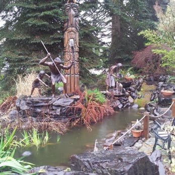 Harmony Lakeside RV Park - Native American statues at the entrance of the office, Very Nice - Campgrounds Near Me - Silver Creek, Washington