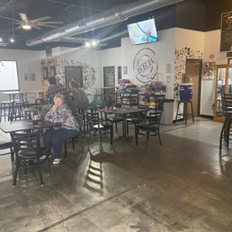 a woman sitting at a table a woman sitting at a table