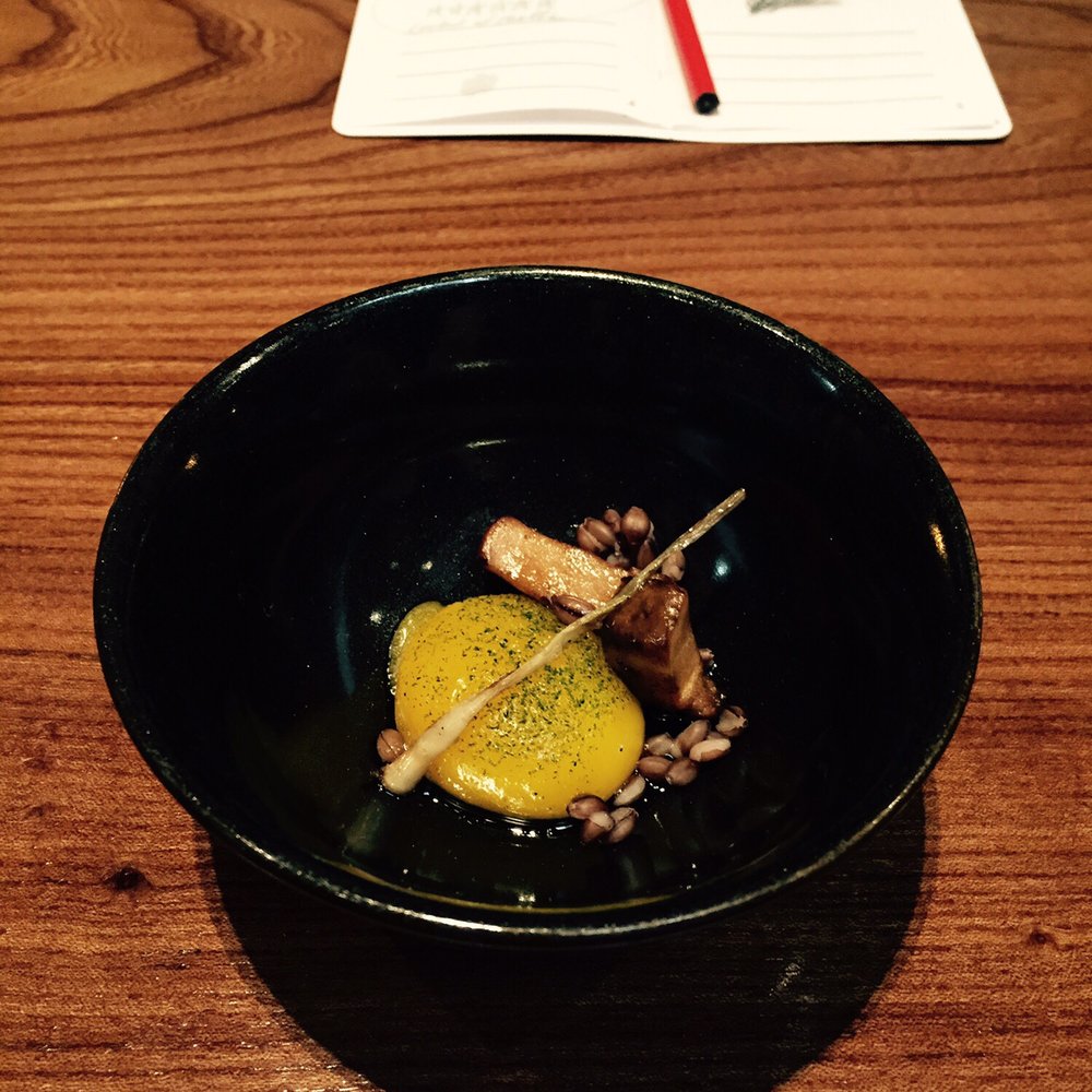 Lazy Bear - Fudge yolk (sous vide egg at 61c til fudgy) was soon to be swimming in a delicious chicken consommé - New American Near Me - San Francisco, California
