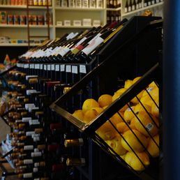 shelves of wine and oranges