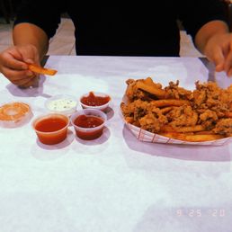 Fried calamari & Cajun fries with 4 sauces!