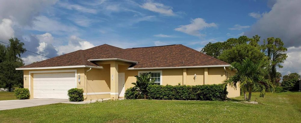 Slide of Trademark Roofing