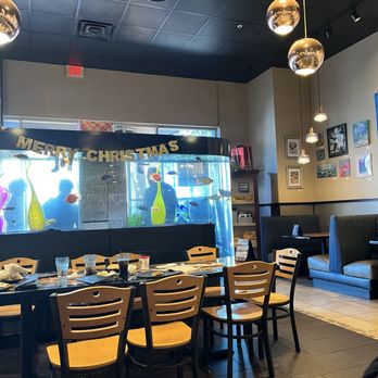 Pizza Gallery & Grill - Gourmet Pizza, Art Gallery & More - Aquarium in the seating area - Pizza Near Me - Melbourne, Florida Pizza Gallery & Grill - Gourmet Pizza, Art Gallery & More - Aquarium in the seating area - Pizza Near Me - Melbourne, Florida