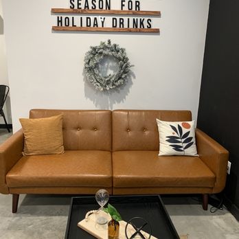 Rise Coffee - a brown leather couch and coffee table - Coffee & Tea Near Me - Marshfield, Missouri Rise Coffee - a brown leather couch and coffee table - Coffee & Tea Near Me - Marshfield, Missouri