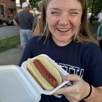 J’s Dog House - my girlfriend holding a hotdog - Hot Dogs Near Me