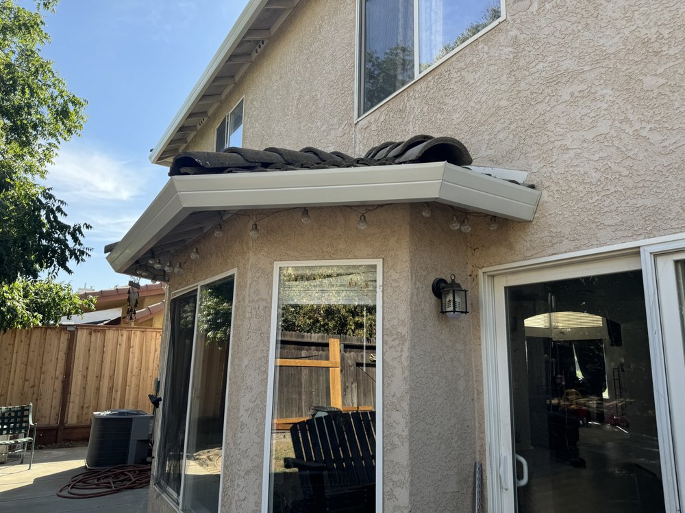 Slide of F&A Roofing & Seamless Gutters