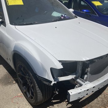 Caliber Collision - Unfinished just sitting in parking lot - Body Shops Near Me - Oceanside, California