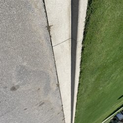 Pfa Pressure Washing - Clean curb
