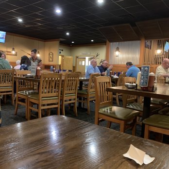 Captain Tom's - a group of people sitting in a restaurant - Seafood Near Me - Kernersville, North Carolina