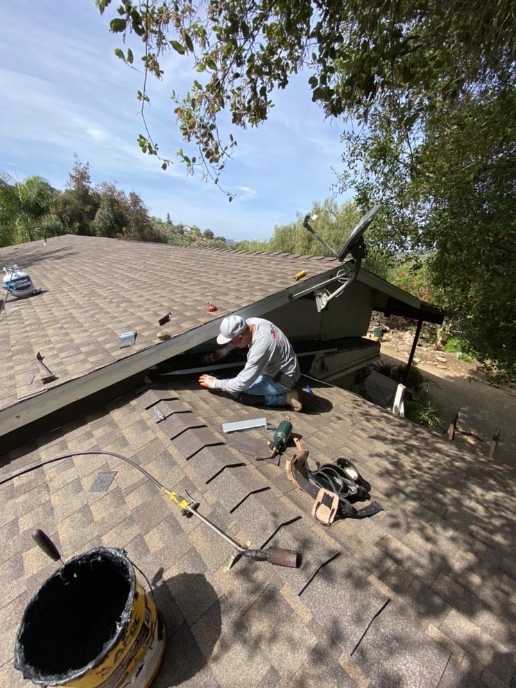 Slide of Palomar Roofing