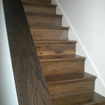 Stanley Flooring - a close up of a wooden staircase - Flooring Near Me