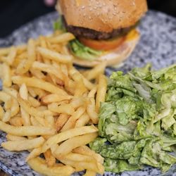 The Family - Burger with fries and a salad