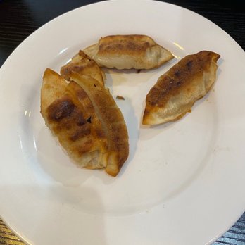 Chun Chinese Cafe - three dumplings on a white plate - Chinese Near Me - Houston, Texas