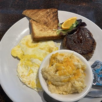 Driftwood Kitchen - Steak and eggs with toast and a side of grits - Southern Near Me - Virginia Beach, Virginia Driftwood Kitchen - Steak and eggs with toast and a side of grits - Southern Near Me - Virginia Beach, Virginia