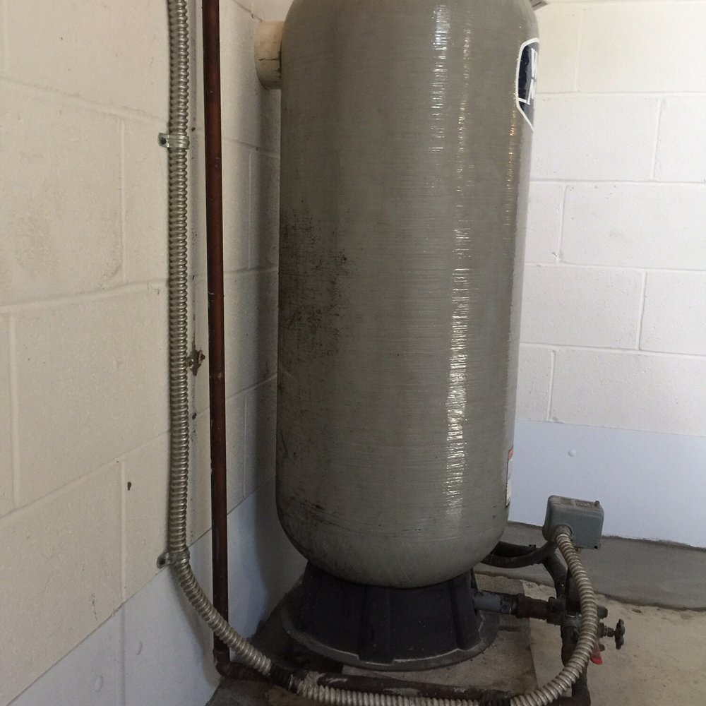 Pioneer Basement Waterproofing - Blocks on the Base of water pressure tank moves out and tank propped on wall with pvc pipe. pioneer left job without informing of this. - Waterproofing Near Me - Akron, Ohio Pioneer Basement Waterproofing - Blocks on the Base of water pressure tank moves out and tank propped on wall with pvc pipe. pioneer left job without informing of this. - Waterproofing Near Me - Akron, Ohio