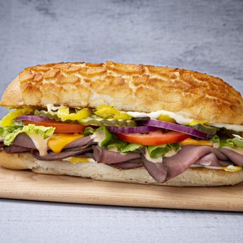 The Sandwich Spot - a sub sandwich on a cutting board - Sandwiches Near Me - Sacramento, California The Sandwich Spot - a sub sandwich on a cutting board - Sandwiches Near Me - Sacramento, California