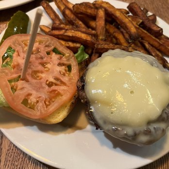Coasters Pub & Biergarten - Classic cheeseburger with sweet potato fries and a pickle - Pubs Near Me - Melbourne, Florida Coasters Pub & Biergarten - Classic cheeseburger with sweet potato fries and a pickle - Pubs Near Me - Melbourne, Florida