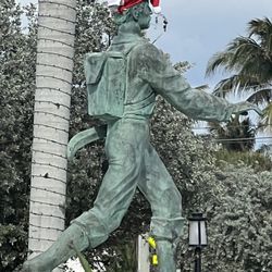 The Barefoot Mailman Statue