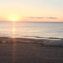 Seaside Restaurant - Sunset view on the beach