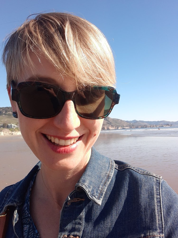 Hair by Krista Dodd Logo