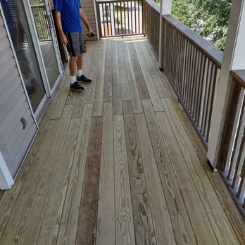 R Dillon Roofing - a man standing on a porch - Roofing Near Me R Dillon Roofing - a man standing on a porch - Roofing Near Me