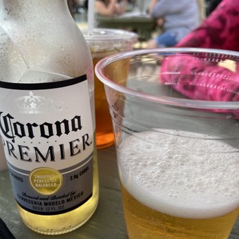 The Crab Claw - a bottle of corona premier and a glass of beer - Seafood Near Me - St. Michaels, Maryland