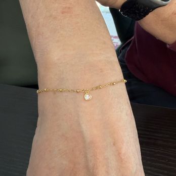 Pretty & Lashed BTX - Permanent bracelet with charm - Eyelash Service Near Me - Bastrop, Texas