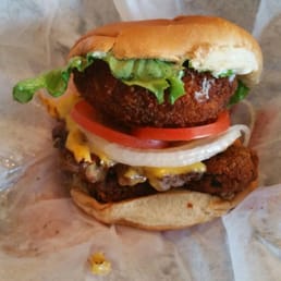 Priest burger - Cheeseburger, 2 roasted portobello mushroom caps breaded with panko stuffed with cheese and fried jalapenos. Priest burger - Cheeseburger, 2 roasted portobello mushroom caps breaded with panko stuffed with cheese and fried jalapenos.