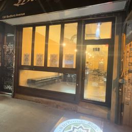 Exterior photo of White Lotus Tattoo Studio - Brooklyn, New York Exterior photo of White Lotus Tattoo Studio - Brooklyn, New York