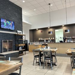 Fernelius Toyota - The snack bar is open and the TV is on, but you can't hear a thing. It's a little cold in here not bad.