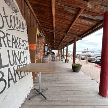Stella's - a bench on the porch of a restaurant - Delis Near Me - Ronan, Montana
