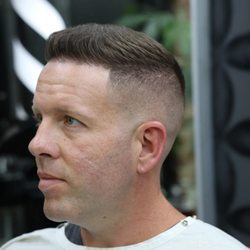 Sculptures Barber Shop - Skinfade with scissor trim
