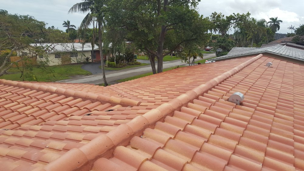 Slide of TNT Roofing