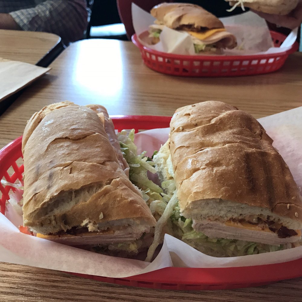 Mama Mia sandwich - turkey, bacon, cheese and lettuce on a bun. Mama Mia sandwich - turkey, bacon, cheese and lettuce on a bun.