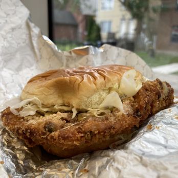 Oji Seichi - a chicken sandwich on a piece of tin foil - Ramen Near Me - Toronto, Ontario Oji Seichi - a chicken sandwich on a piece of tin foil - Ramen Near Me - Toronto, Ontario