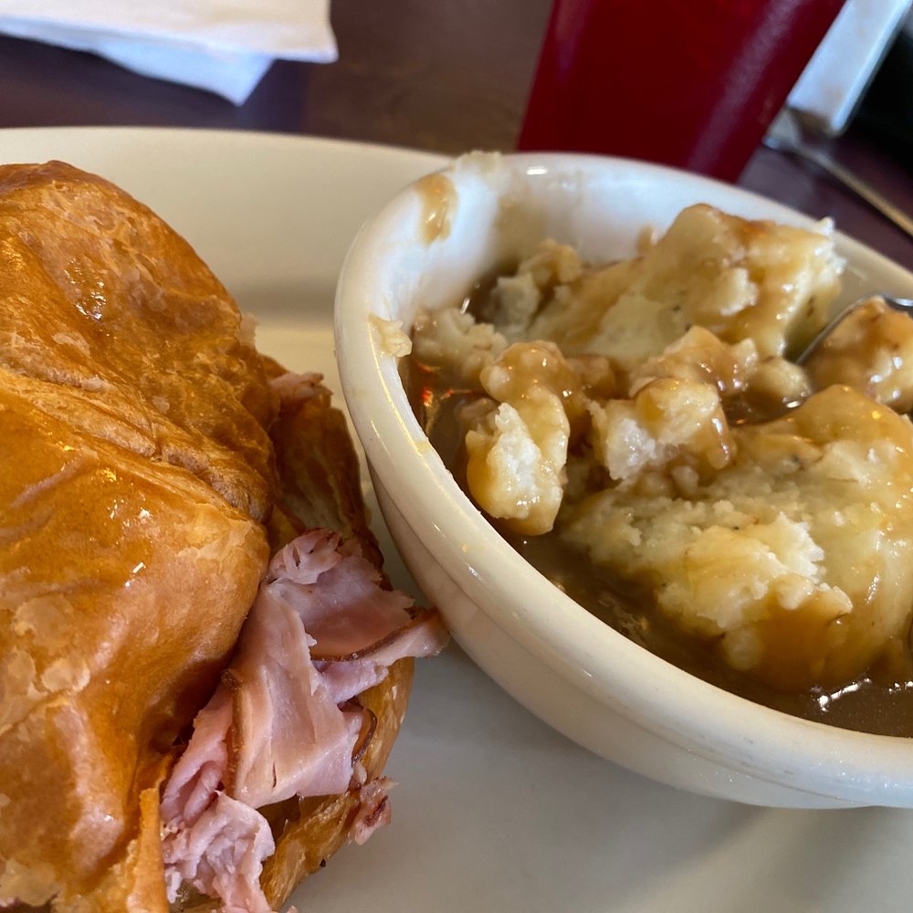 S&H Good Eats Cafe - Ham and cheese on a croissant with mashed pototoe! - American Near Me - Slidell, Louisiana
