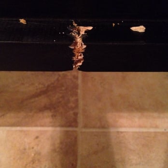 Living Spaces - Damage from bent screw - Furniture Stores Near Me - Gilbert, Arizona