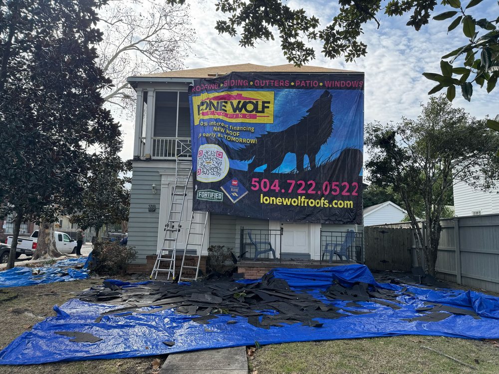 Slide of Lone Wolf Roofing