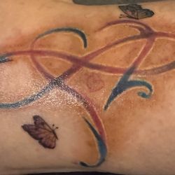Epic Tattoos - Infinity circle, two hearts and two butterflies.