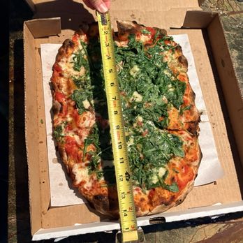 Belluz Pizza - Roman style pizza with arugula and herb cream - Pizza Near Me - Coral Gables, Florida Belluz Pizza - Roman style pizza with arugula and herb cream - Pizza Near Me - Coral Gables, Florida