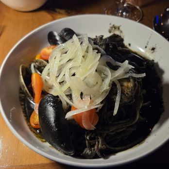 Fattoria E Mare - Spaghetti al Nero squid ink pasta with variety of seafood - Italian Near Me - Half Moon Bay, California