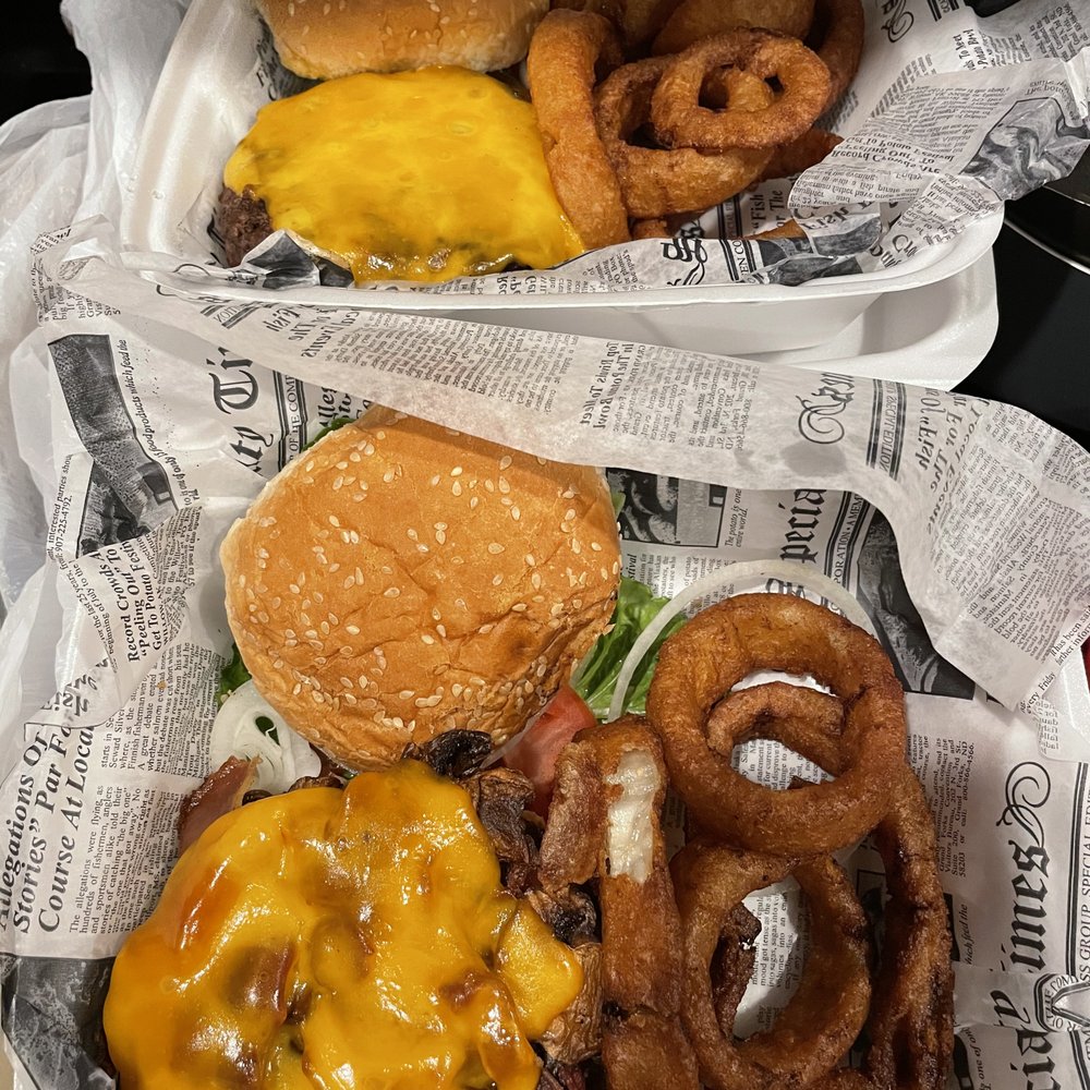 "Bacon" and "Bleu" burgers missing Bacon and/or Bleu But somehow the ADDED toppings made it on. "Bacon" and "Bleu" burgers missing Bacon and/or Bleu But somehow the ADDED toppings made it on.