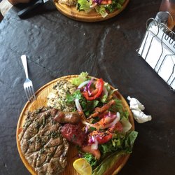 El Guacho - Churrasco de res in front and pechuga de pollo in the back. Do yourself a favor and come try it!