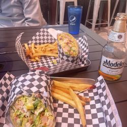 Vinwood Taphouse - Grilled chicken wrap with fries. Sharing one order.