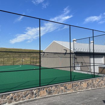 Fence City - Black Chain Link fence around residential sport court - Fences & Gates Near Me - Hatfield, Pennsylvania Fence City - Black Chain Link fence around residential sport court - Fences & Gates Near Me - Hatfield, Pennsylvania